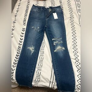 Distressed Blue Jeans Women’s Denim